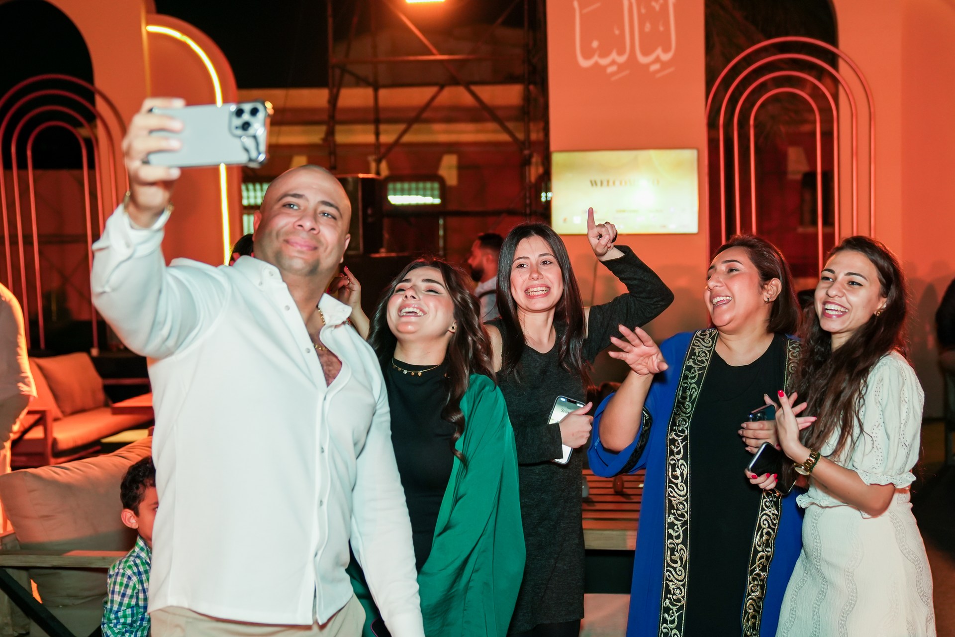 Colleagues sharing a light moment at ATRIC's Ramadan gathering