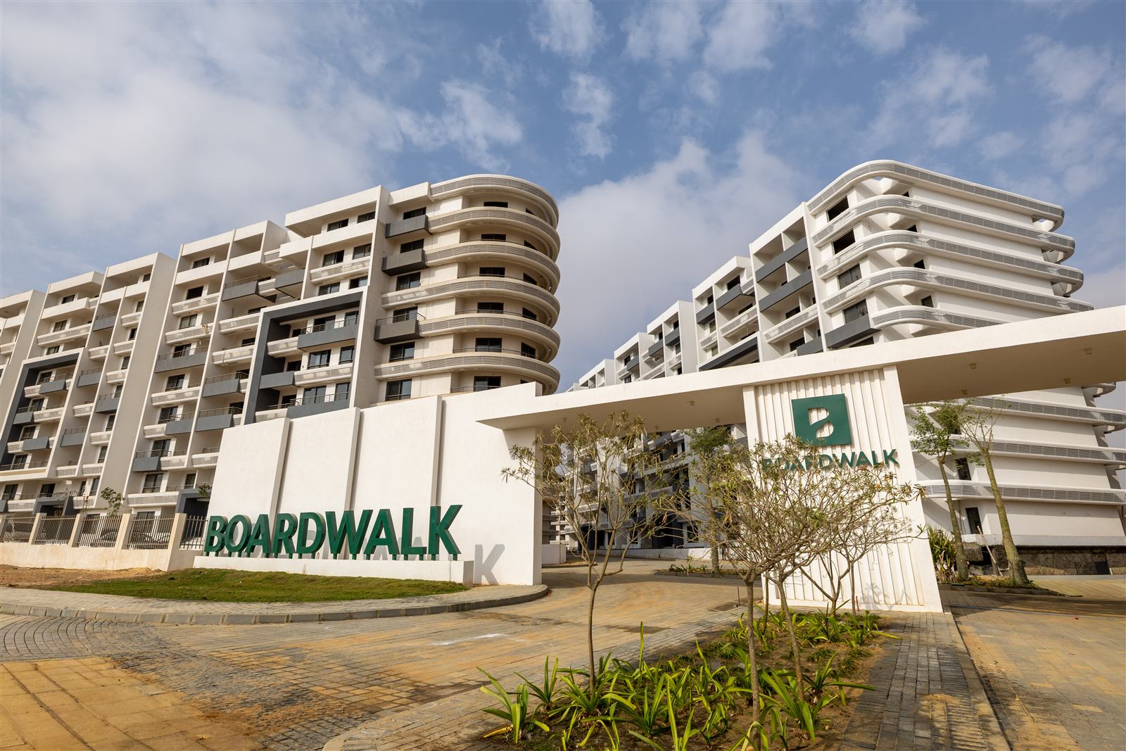 The Boardwalk entrance sign with completed Zone C buildings behind it