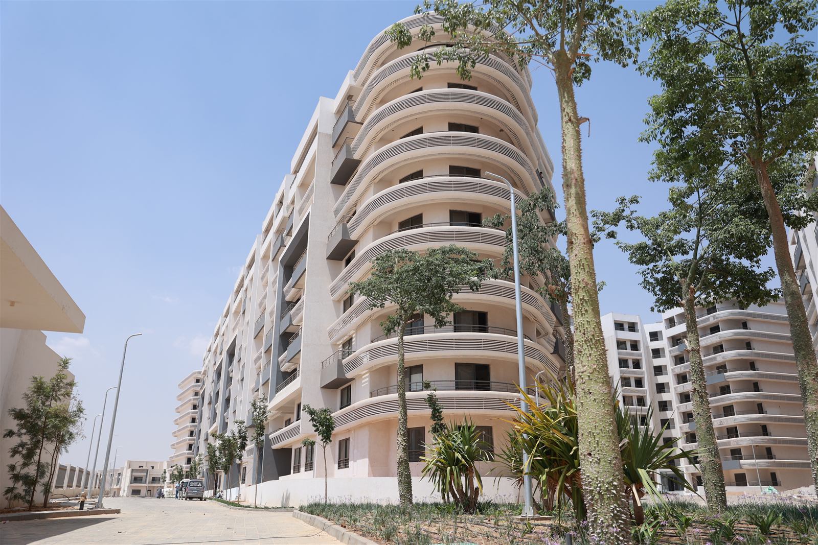 Curved facade detail photographed on site, July 2026